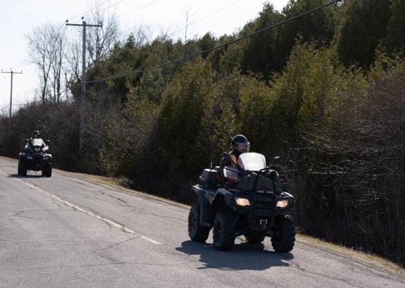 April 17, 2025, Godmanchester, Pq, CANADA: Surete du Quebec and RCMP officers arrive back at a command post after searching for a woman and her two children who are missing crossing the border into Canada illegally overnight in Godmanchester, Que., on Thursday, April 17, 2025. Godmanchester CANADA  - ZUMAc35_ 20250417_zaf_c35_064 Copyright: xChristinnexMuschix