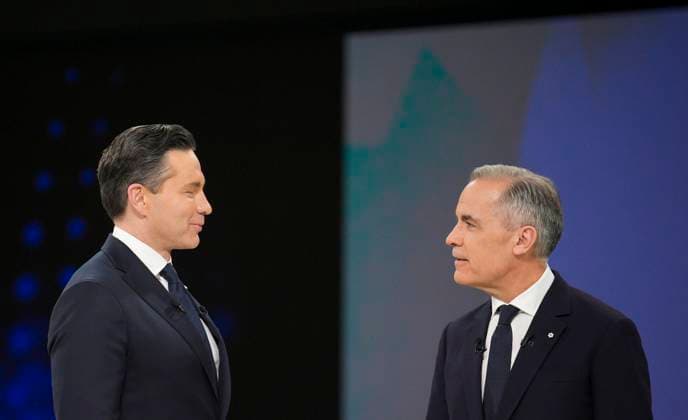 April 17, 2025, Montreal, Quebec, Canada: Conservative Leader Pierre Poilievre, left, and Liberal Leader Mark Carney talk following the English-language federal leaders debate in Montreal, Thursday, April 17, 2025. Montreal Canada  - ZUMAc35_ 20250417_zaf_c35_159 Copyright: xChristopherxKatsarovx