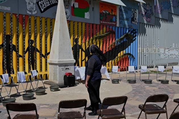 April 17, 2025, Tijuana, Baja California, Mexico: A nun from the Migrant Defense Coalition from the Mother Asunta Institute in Tijuana, Mexico prepares the annual foot washing ceremony where volunteers wash and clean the feet of migrants during a ceremony for holy week in accordance to the twelve apostles remembrance of Jesus Christ Ã¢â‚¬oeFor I have given you an example, that you should do as I have done to youÃ¢â‚¬Â as Father Pat Murphy compares Jesus act to migrants plight and the unfair treatment of migrants and urged for a time of reflection for those seeking the right to freedom of movement and humanitarian asylum on Thursday, April 17, 2025 at TijuanaÃ¢â‚¬â ¢s Friendship Park circle on the US-Mexico border. Tijuana Mexico - ZUMAm180 20250417_zip_m180_004 Copyright: xCarlosxA.xMorenox