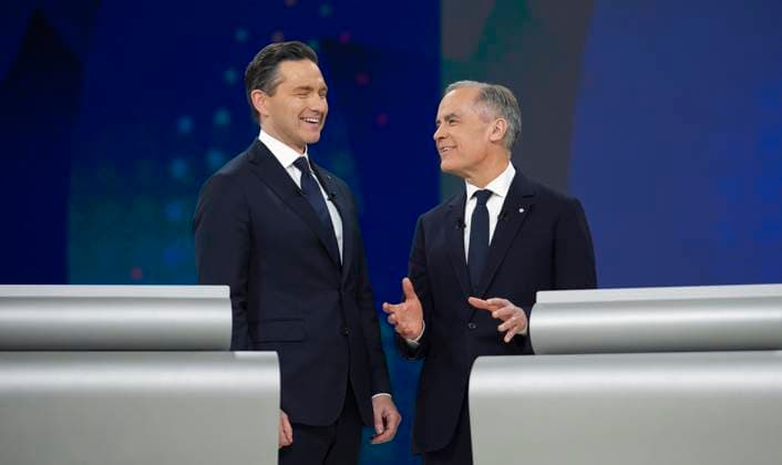 April 17, 2025, Montreal, Quebec, Canada: Conservative Leader Pierre Poilievre, left, and Liberal Leader Mark Carney talk following the English-language federal leaders debate in Montreal, Thursday, April 17, 2025. Montreal Canada  - ZUMAc35_ 20250417_zaf_c35_210 Copyright: xChristopherxKatsarovx