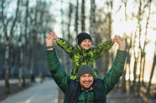 Father and son enjoying a walk in the park during spring or autumn model released, Symbolfoto, ANAF04562