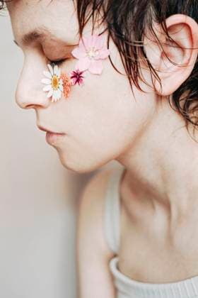 Creative Highlights Symbolfotos Artistic portrait of a woman with wet hair and flowers on her face model released, Symbolfoto, SVCF00454