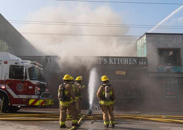 April 23, 2025, Vancouver, Bc, CANADA: Vancouver firefighters work on putting out hot spots of a three alarm fire on East Hastings Street in Vancouver, on Wednesday April 23, 2025. Vancouver CANADA  - ZUMAc35_ 20250423_zaf_c35_027 Copyright: xRichxLamx