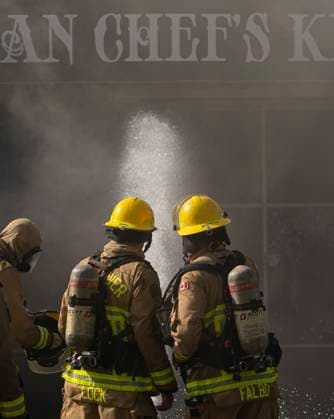April 23, 2025, Vancouver, Bc, CANADA: Vancouver firefighters pour water on hot spots while battling a three alarm fire on East Hastings Street in Vancouver, on Wednesday April 23, 2025. Vancouver CANADA  - ZUMAc35_ 20250423_zaf_c35_029 Copyright: xRichxLamx