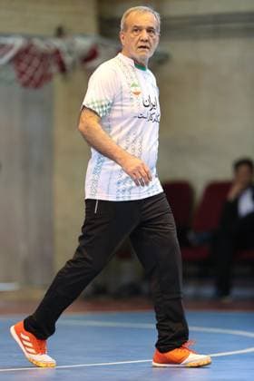 April 25, 2025, Tehran, Iran: Iranian President MASOUD PEZESHKIAN participates in a football match to celebrate Iran Labor Week and honor the laborers of the nation, competing between the workers and veterans teams. Tehran Iran - ZUMAi98_ 20250425_zih_i98_022 Copyright: xIranianxPresidencyx
