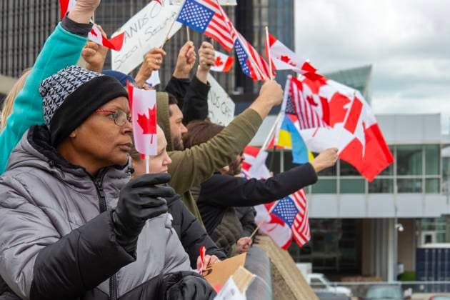 April 26, 2025, Detroit, Michigan, USA: Detroit, Michigan USA - 26 April 2025 - A Bridging Our Friendship rally on the banks of the Detroit River pushes back at the anti-Canada attitude of the Trump Administration. A similar rally took place acress the river in Windsor, Ontario, and at other border crossings in Michigan and Ontario. Detroit USA - ZUMAw66_ 20250426_zaf_w66_001 Copyright: xJimxWestx