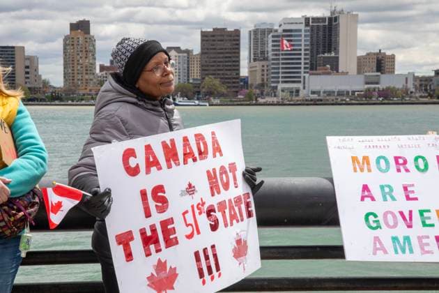 April 26, 2025, Detroit, Michigan, USA: Detroit, Michigan USA - 26 April 2025 - A Bridging Our Friendship rally on the banks of the Detroit River pushes back at the anti-Canada attitude of the Trump Administration. A similar rally took place acress the river in Windsor, Ontario, and at other border crossings in Michigan and Ontario. Detroit USA - ZUMAw66_ 20250426_zaf_w66_009 Copyright: xJimxWestx