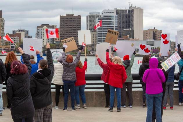 April 26, 2025, Detroit, Michigan, USA: Detroit, Michigan USA - 26 April 2025 - A Bridging Our Friendship rally on the banks of the Detroit River pushes back at the anti-Canada attitude of the Trump Administration. A similar rally took place acress the river in Windsor, Ontario, and at other border crossings in Michigan and Ontario. Detroit USA - ZUMAw66_ 20250426_zaf_w66_012 Copyright: xJimxWestx