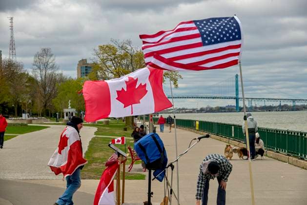 US-Canada Border Solidarity Rally Canadians gather at the Detroit River waterfront in Windsor, Ontario, during the Bridging Our Friendship solidarity rally with Detroit residents on April 26, 2025. The cross-border demonstration promoted US-Canada alliances while protesting the policies of President Donald Trump. Windsor Ontario Canada Copyright: xDominicxGwinnx