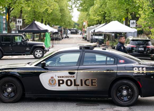 April 27, 2025, Vancouver, Bc, CANADA: A Vancouver Police vehicle blocks the street leading the location where a vehicle drove into crowd, at a street festival on the night before, in Vancouver on Sunday April 27, 2025. Vancouver CANADA  - ZUMAc35_ 20250427_zaf_c35_019 Copyright: xRichxLamx
