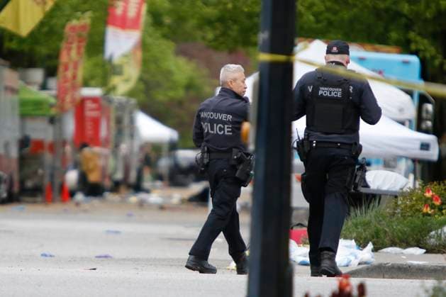 April 28, 2025, Vancouver, Vancouver, Bc, Canada: Police officers working on 41st and Fraser in Vancouver on April 28, 2025, two days after a car drove into a crowd during the Lapu Lapu Festival. Police said a 30-year-old man drove his car into a crowd at a Filipino street festival, killing at least eleven people and injuring multiple others. ( ) Vancouver Canada - ZUMAp175 1061483020st Copyright: xTomazxJr Pximagesx