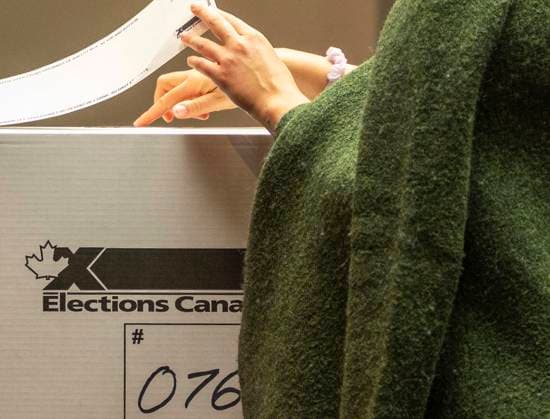 (250428) -- TORONTO, April 28, 2025 -- A woman casts her vote at a polling station in Toronto, Canada, on April 28, 2025. Millions of Canadians are lining up to cast their ballots on Monday as U.S. President Donald Trump weighed in on the election with a new threat of annexation of the country. (Photo by Xinhua) CANADA-TORONTO-ELECTION ZouxZheng 
