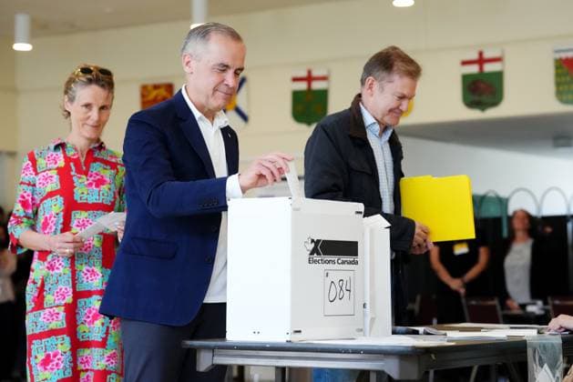 April 28, 2025, Ottawa, On, Canada: Liberal Leader Mark Carney casts his vote in Ottawa on Monday, April 28, 2025. Ottawa Canada  - ZUMAc35_ 20250428_zaf_c35_065 Copyright: xSeanxKilpatrickx