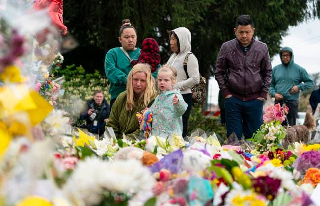 April 28, 2025, Vancouver, Bc, CANADA: Mourners leaves flowers at a memorial site for the victims of an incident where a car drove through a crowd killing multiple people in Vancouver, Monday April 28, 2025. Tributes, condolences are coming in for the 11 people killed in a vehicle ramming at a Vancouver festival Saturday. Vancouver CANADA  - ZUMAc35_ 20250428_zaf_c35_079 Copyright: xRichxLamx