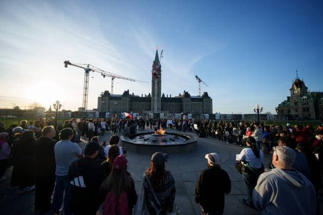 April 28, 2025, Ottawa, On, Canada: People listen to community members speak during a vigil on Parliament Hill for the victims of an attack that killed 11 people at a Vancouver Filipino heritage festival on Saturday, in Ottawa, on Monday, April 28, 2025. Ottawa Canada  - ZUMAc35_ 20250428_zaf_c35_084 Copyright: xChrisxTanouyex