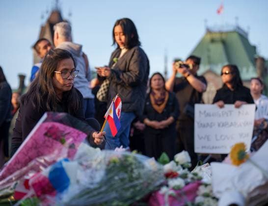 April 28, 2025, Ottawa, On, Canada: People leave flowers and light candles during a vigil for the victims of an attack that killed 11 people at a Vancouver Filipino heritage festival on Saturday, in Ottawa, on Monday, April 28, 2025. Ottawa Canada  - ZUMAc35_ 20250428_zaf_c35_086 Copyright: xChrisxTanouyex