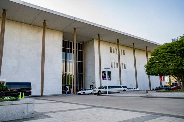 DC Arts Hub Cancels Shows A vehicle drives past the entrance sign to the John F. Kennedy Center for the Performing Arts in Washington, D.C., on May 2, 2025. People gathered outside of the Kennedy Center to protest the venue s decision to cancel several events that had been scheduled to take place as part of Pride Month activities June 5 8, 2025. washington District of Columbia United States Copyright: xAndrewxThomasx