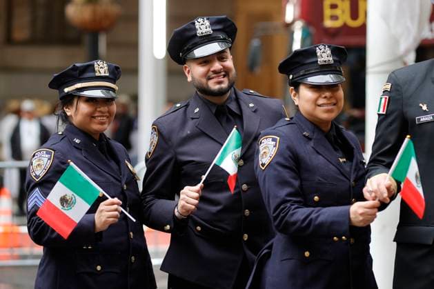 May 5, 2025, Ny, USA: NEW YORK, NY - MAY 5: Mexican traditional dance group, VIPs, along with New York City Mayor Eric Adams delivers remarks during a flag-raising ceremony for Mexico in honor of Cinco de Mayo on a very rainy day at Bowling Green Park on May 5, 2025, in New York City. Despite the heavy rain, the event proceeded with cultural pride and participation from city officials and community leaders. The soaked mayor addressed attendees under umbrellas and rain gear as the Mexican flag was hoisted to commemorate the holiday. .Photo: Luiz Rampelotto EuropaNewswire. USA - ZUMAra1_ 20250505_aap_ra1_017 Copyright: xLuizxRampelotto Europanewswirex