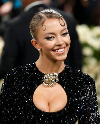 Sydney Sweeney arrives on the red carpet at the 2025 Met Gala celebrating the opening of Superfine: Tailoring Black Style at The Metropolitan Museum of Art on Monday, May 5, 2025 in New York City.  NYP20250505120 JOHNxANGELILLO