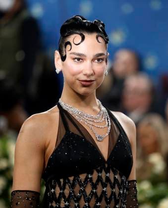 Dua Lipa arrives on the red carpet at the 2025 Met Gala celebrating the opening of Superfine: Tailoring Black Style at The Metropolitan Museum of Art on Monday, May 5, 2025 in New York City.  NYP20250505122 JOHNxANGELILLO