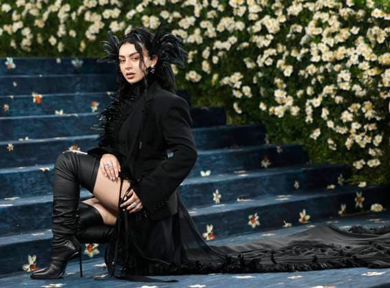 Charli XCX arrives on the red carpet at the 2025 Met Gala celebrating the opening of Superfine: Tailoring Black Style at The Metropolitan Museum of Art on Monday, May 5, 2025 in New York City.  NYP20250505138 JOHNxANGELILLO