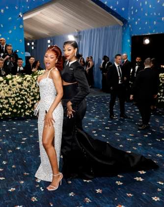 Megan Thee Stallion and Angel Reese arrive on the red carpet at the 2025 Met Gala celebrating the opening of Superfine: Tailoring Black Style at The Metropolitan Museum of Art on Monday, May 5, 2025 in New York City.  NYP20250505174 JOHNxANGELILLO