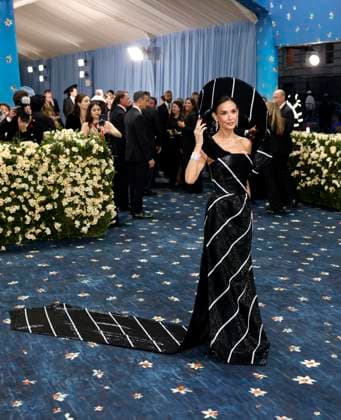 Demi Moore arrives on the red carpet at the 2025 Met Gala celebrating the opening of Superfine: Tailoring Black Style at The Metropolitan Museum of Art on Monday, May 5, 2025 in New York City.  NYP20250505182 JOHNxANGELILLO