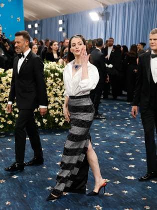 Anne Hathaway arrives on the red carpet at the 2025 Met Gala celebrating the opening of Superfine: Tailoring Black Style at The Metropolitan Museum of Art on Monday, May 5, 2025 in New York City.  NYP20250505563 JOHNxANGELILLO