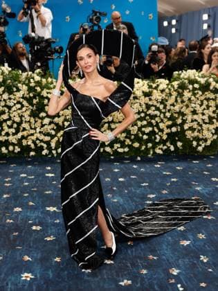 Demi Moore arrives on the red carpet at the 2025 Met Gala celebrating the opening of Superfine: Tailoring Black Style at The Metropolitan Museum of Art on Monday, May 5, 2025 in New York City.  NYP20250505596 JOHNxANGELILLO