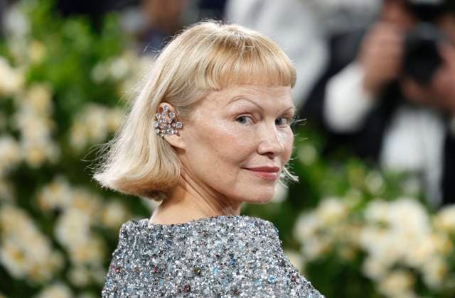 Pamela Anderson arrives on the red carpet at the 2025 Met Gala celebrating the opening of Superfine: Tailoring Black Style at The Metropolitan Museum of Art on Monday, May 5, 2025 in New York City.  NYP20250505927 JOHNxANGELILLO