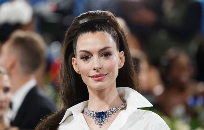 Anne Hathaway arrives on the red carpet at the 2025 Met Gala celebrating the opening of Superfine: Tailoring Black Style at The Metropolitan Museum of Art on Monday, May 5, 2025 in New York City.  NYP20250505929 JOHNxANGELILLO