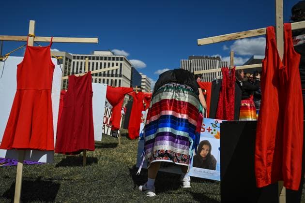 Edmonton Marks Red Dress Day To Honour Missing And Murdered Indigenous Women And Girls EDMONTON, CANADA MAY 5: A symbolic memorial of wooden crosses and red dresses, honouring missing and murdered Indigenous women and girls (MMIWG), outside the Alberta Legislature in Edmonton on May 5, 2025. Red Dress Day is an annual event initiated by the REDress Project to honour the lives of MMIWG across Canada, first observed on May 5, 2010. Edmonton Canada  Copyright: xArturxWidakx originalFilename: widak-edmonton250505_npeTd.jpg