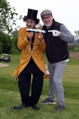 Europa Park Eagles Charity Golfcup 2025 Paul Reeves jokes with Charlie Chaplin Albert de Paris Europa Park Eagles Charity Golfcup 2025 on 05 05 2025 on the 18 hole course of the Europa Park Golfclub Breisgau e V Baden Württemberg, Germany