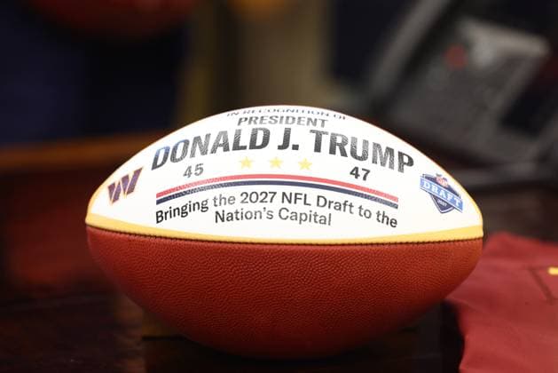 Trump Announces DC Will Host the 2027 NFL Draft A football with US President Donald Trump™s name on his desk in the Oval Office as Trump announces DC will host the 2027 NFL draft in the Oval Office of the White House in Washington, DC USA, 05 May 2025. The move comes after the Washington Commanders announced they planned to return to DC in a new stadium built on the site of their old one. Credit: Jim LoScalzo Pool via CNP AdMedia Washington District of Columbia United States of America EDITORIAL USE ONLY  Copyright: xx JJL21638-5370459 CNP AdMediax admphotostwo930262