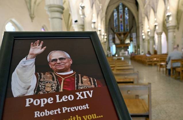 POPE LEO XIV CHURCH MASS, A portrait of Pope Leo XIV is seen at The Cathedral of St Stephen in Brisbane, Friday, May 9, 2025. Australian Catholics are welcoming the appointment of American Robert Prevost as Pope Leo XIV, saying he is approachable and a willing listener. ( NO ARCHIVING BRISBANE QUEENSLAND AUSTRALIA  Copyright: xDARRENxENGLANDx 20250509193233111180