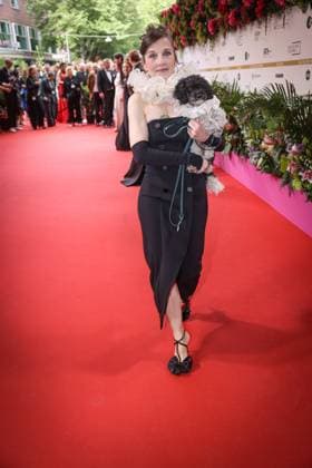 GERMAN FILM AWARD 2025 ceremony in Berlin Meret Becker with dog on the red carpet at the Lola German Film Award 2025 ceremony at the Theater am Potsdamer Platz in Berlin Date 10 05 2025 Copyright: xEventpressx