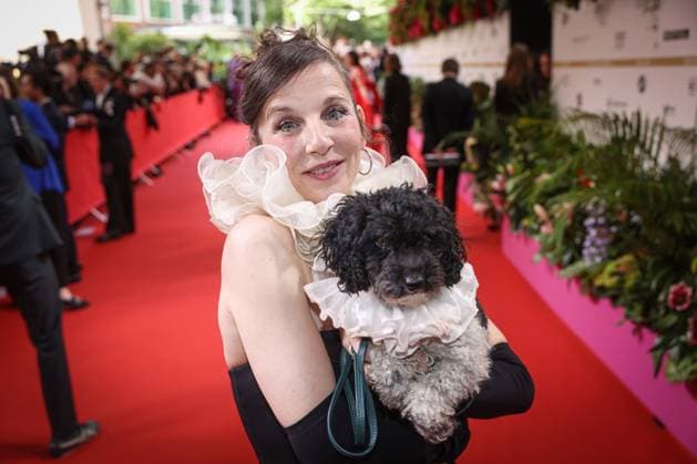 GERMAN FILM AWARD 2025 ceremony in Berlin Meret Becker with dog on the red carpet at the Lola German Film Award 2025 ceremony at the Theater am Potsdamer Platz in Berlin Date 10 05 2025 Copyright: xEventpressx