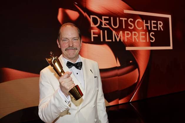 Godehard Giese, the winner with his Lola statue at the German Film Award ceremony on 9 05 2025 in Berlin German Film Award 2025 in Berlin Winner at the aftershow party