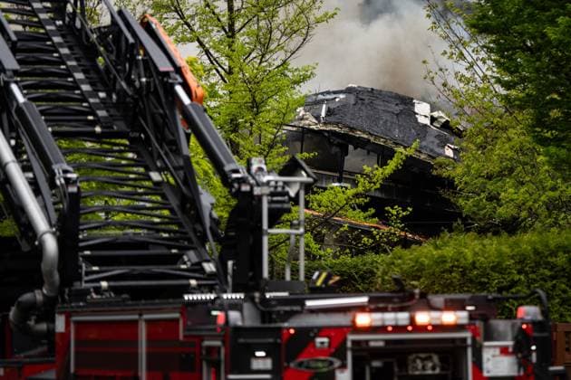 May 10, 2025, North Vancouver, Bc, CANADA: North Vancouver Fire Department fights a fire as the room of Silverlynn Apartments, a three-storey seniors housing complex, appears to have collapsed in North Vancouver, B.C., Saturday, May 10, 2025. North Vancouver CANADA  - ZUMAc35_ 20250510_zaf_c35_025 Copyright: xEthanxCairnsx