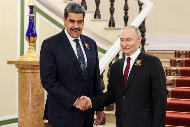 RUSSIA, MOSCOW - MAY 9, 2025: Russia s President Vladimir Putin (R) and Venezuela s President Nicolas Maduro shake hands during a meeting at the Moscow Kremlin before a 9 May Victory Day military parade marking the 80th anniversary of the victory over Nazi Germany in World War II. Russian President Moscow Russia  - ZUMAt113 20250509_zaa_t113_393 Copyright: xMikhailxMetzelx