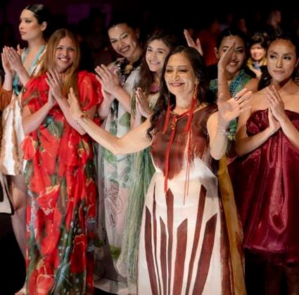 May 11, 2025 - Santa Fe, New Mexico, USA - PM Waterlilly models applaud candidate for governor of New Mexico, DEB HAALAND (center, right) after they all walked the runway during the Second Annual Southwestern Association for Indian Arts (SWAIA) Native Fashion Week. An offshoot of the Santa Fe Indian Market, Fashion Week highlights indigenous design, creativity and representation in the fashion industry. Santa Fe USA - ZUMAce6_ 20250511_zaf_ce6_001 Copyright: xBrianxCahnx