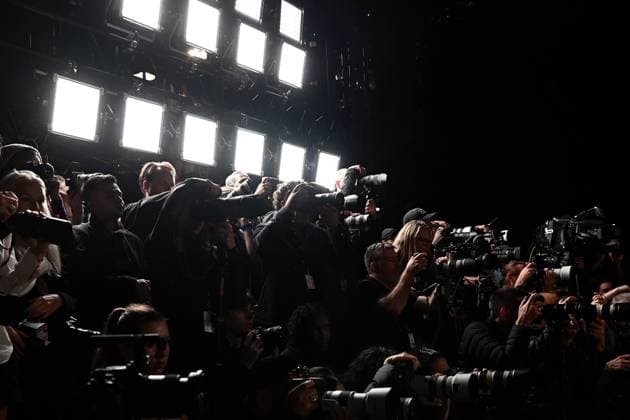 AUSTRALIAN FASHION WEEK 2025, Photographers take pictures as models walk down the runway during the Carla Zampatti Runway Show as part of Australian Fashion Week 2025 in Sydney, Monday, May 12, 2025. ( NO ARCHIVING SYDNEY NEW SOUTH WALES Australia  Copyright: xSTEVENxSAPHOREx 20250513181391923855
