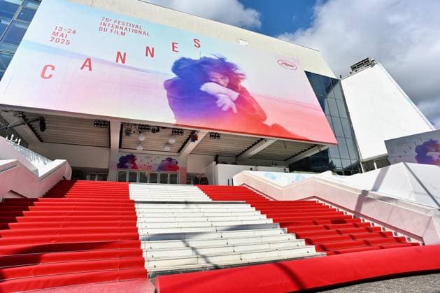 Cannes - Red Carpet Roll Out Workers prepare the red carpet to be rolled out ahead of the 78th annual Cannes Film Festival on May 13, 2025 in Cannes, France. Photo by Franck Caste ABACAPRESS.COM Cannes France  Copyright: xCastelxFranck ABACAx