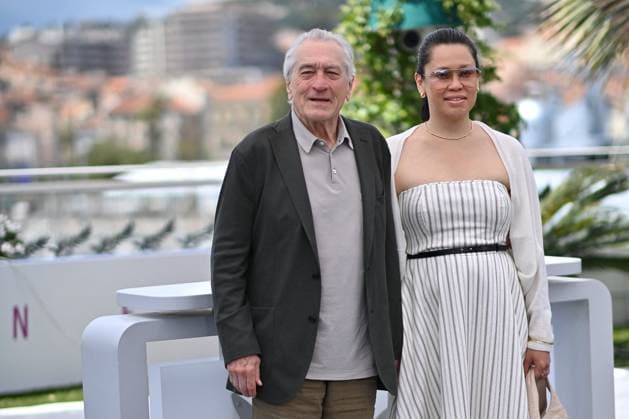 Cannes Honorary Palme d’Or Robert De Niro Robert De Niro and Tiffany Chen waves during the photocall for Robert De Niro Honorary Palme Dor at the 78th annual Cannes Film Festival at Palais des Festivals on May 13, 2025 in Cannes, France Photo by Franck Castel ABACAPRESS.COM Cannes France  Copyright: xCastelxFranck ABACAx
