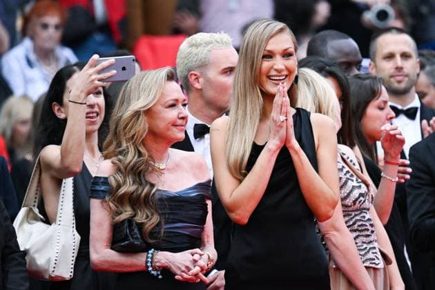 Cannes - Opening Red Carpet AM Bella Hadid and Caroline Scheufele attending the Opening Ceremony and Leave One Day Premiere at the 78th Cannes Film Festival on May 13, 2025, in Cannes, southern France. Photo by Aurore Marechal ABACAPRESS.COM Cannes France  Copyright: xMarechalxAurore ABACAx