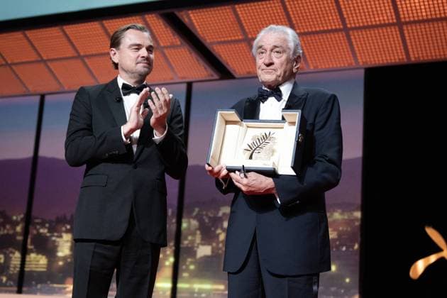 Cannes - Opening Ceremony DN. Robert De Niro accepts the honorary Palme d Or from Leonardo DiCaprio onstage during the opening ceremony at the 78th annual Cannes Film Festival at the Palais de Festival on May 13, 2025 in Cannes, France. Photo by David NIVIERE ABACAPRESS.COM CANNES France  Copyright: xNivierexDavid ABACAPRESS.COMx