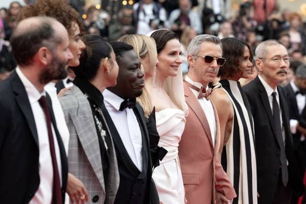 Cannes - Opening Ceremony DN Jury Members Dieudo Hamadi, Alba Rohrwacher, Jury President Juliette Binoche, Jeremy Strong, Halle Berry and Hong Sang-soo attend the red carpet for the opening ceremony and Partir Un Jour (Leave One Day) screening at the 78th annual Cannes Film Festival at Palais des Festivals on May 13, 2025 in Cannes, France. Photo by David NIVIERE ABACAPRESS.COM CANNES France  Copyright: xNivierexDavid ABACAPRESS.COMx