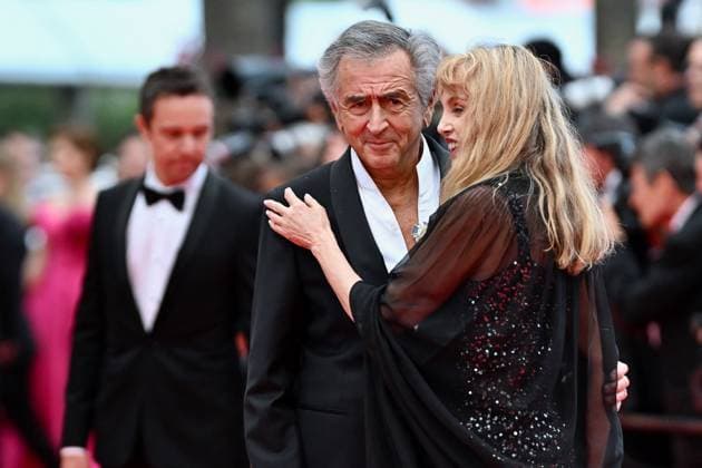 Cannes - Opening Ceremony Red Carpet Bernard-Henri Levy and Arielle Dombasle at the Opening Ceremony and Leave One Day Premiere at the 78th Cannes Film Festival held at Palais des Festivals on May 13, 2025 in Cannes, France. Phot oby Franck Castel ABACAPRESS.COM Cannes France  Copyright: xCastelxFranck ABACAx