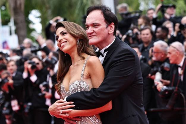 (250514) -- CANNES, May 14, 2025 -- U.S. director Quentin Tarantino (R) arrives on the red carpet for the opening ceremony of the 78th edition of the Cannes Film Festival in Cannes, France, May 13, 2025. ) FRANCE-CANNES-FILM FESTIVAL-OPENING GaoxJing 