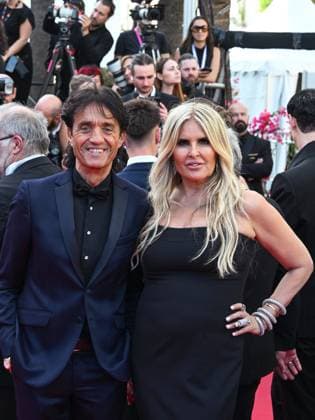 Cannes, France: Cannes, 78th Cannes Film Festival 2025 - evening 2 - Red Carpet of the film Mission Impossible - The Final Reckoning. In the photo: Tiziana Rocca and Giulio Base Cannes France  - ZUMAp169 20250514_zea_p169_590 Copyright: xManuelexMangiarottix